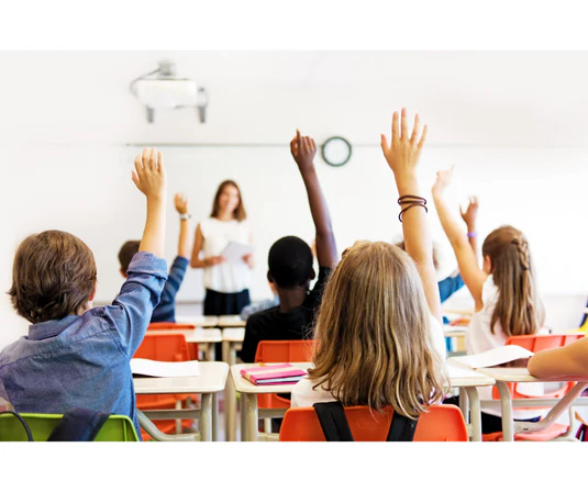 A classroom of students reading at their desks, representing dyslexia support integrated into daily instruction